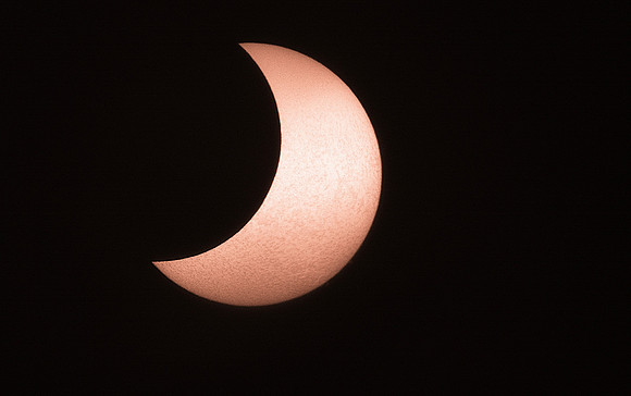 The Sun in Ha During an Eclipse